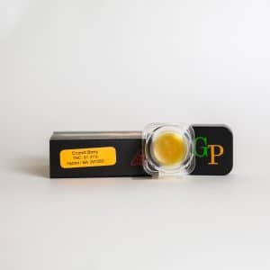 A 1g container of Sugar Wax Crunch Berry (THC: 81.31%, Hybrid) rests on a black "GP" box with a BA: WT25D sticker.