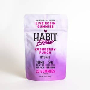 A purple and white resealable pouch labeled "HABIT Exotics KUSHBERRY PUNCH Gummies - Sativa - 100mg," containing 20 gummies with a total of 100mg Delta 9 THC per pack.