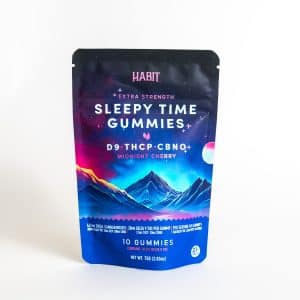 A package of HABIT Extra Strength Sleep Time Gummies—Midnight Cherry flavor with D9-THCP and CBNO—featuring a mountain landscape design on the front.