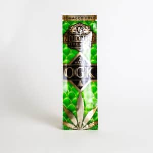 A green and gold package of Billionaire Ogk Wraps labeled "OGK," contains 2 tobacco-free hemp wraps.